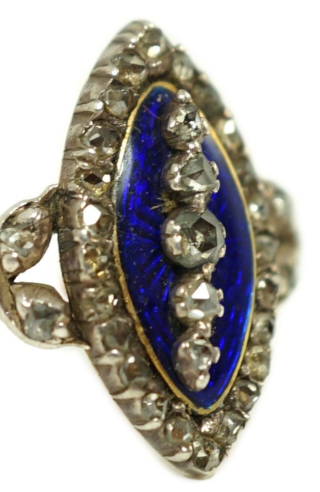 An 19th century gold, rose cut diamond and blue guilloche enamel set marquise shaped ring